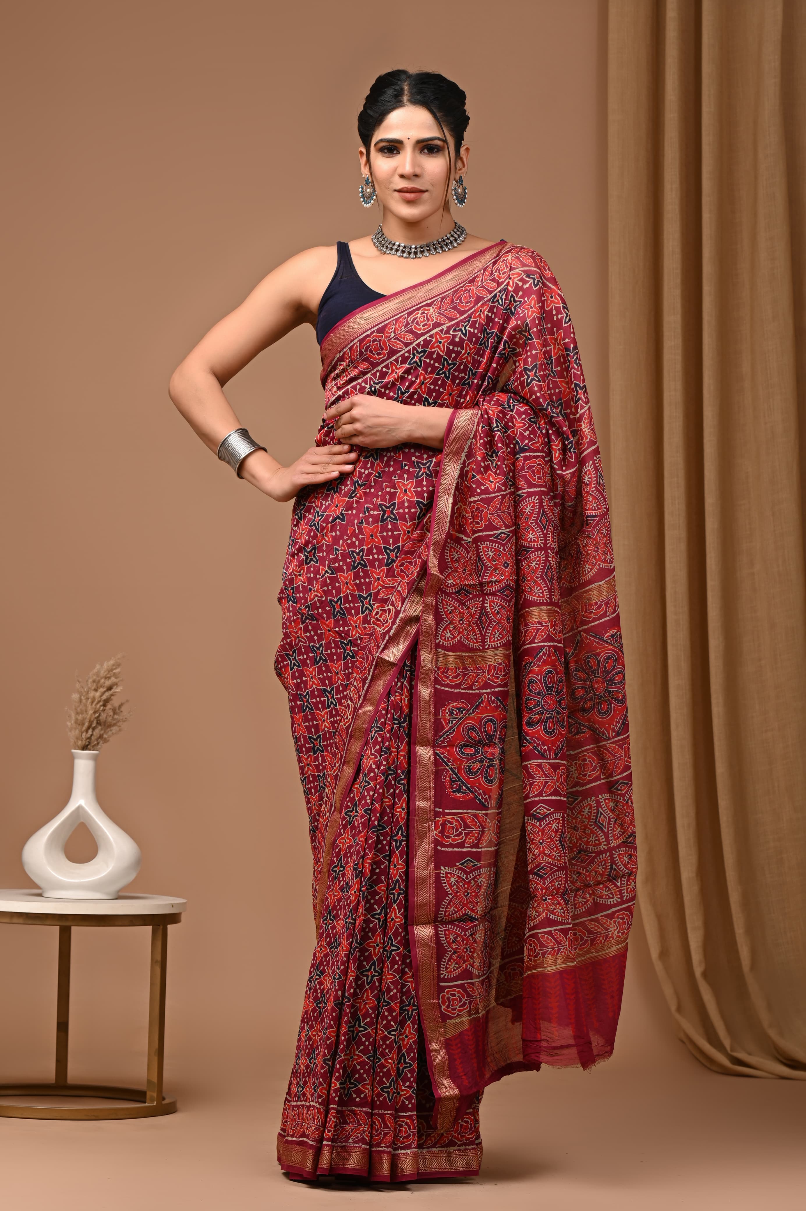 Maroon Maheshwari Silk Saree with Star Motif & Ornate Pallu